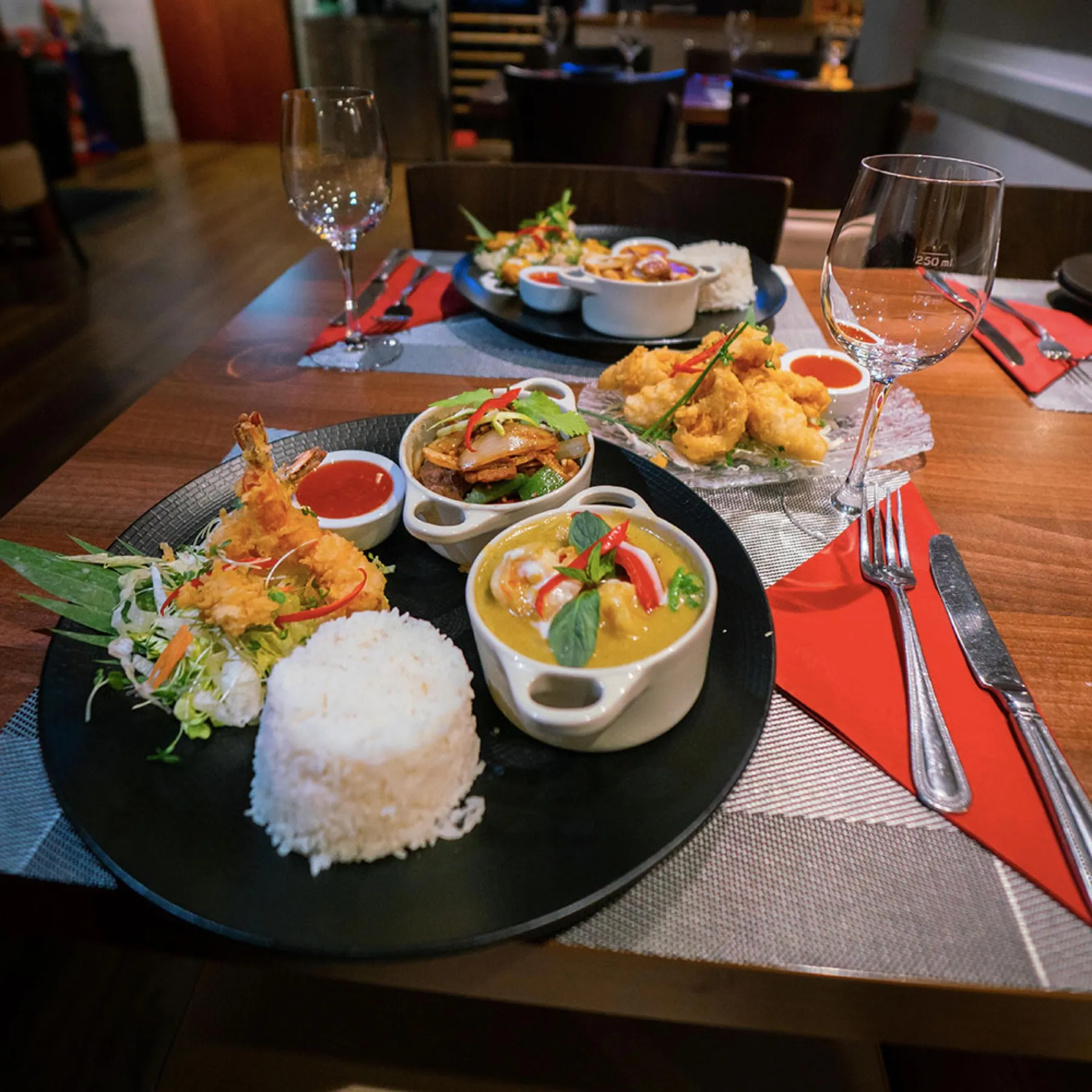 A spread of Thai dishes with jasmine rice